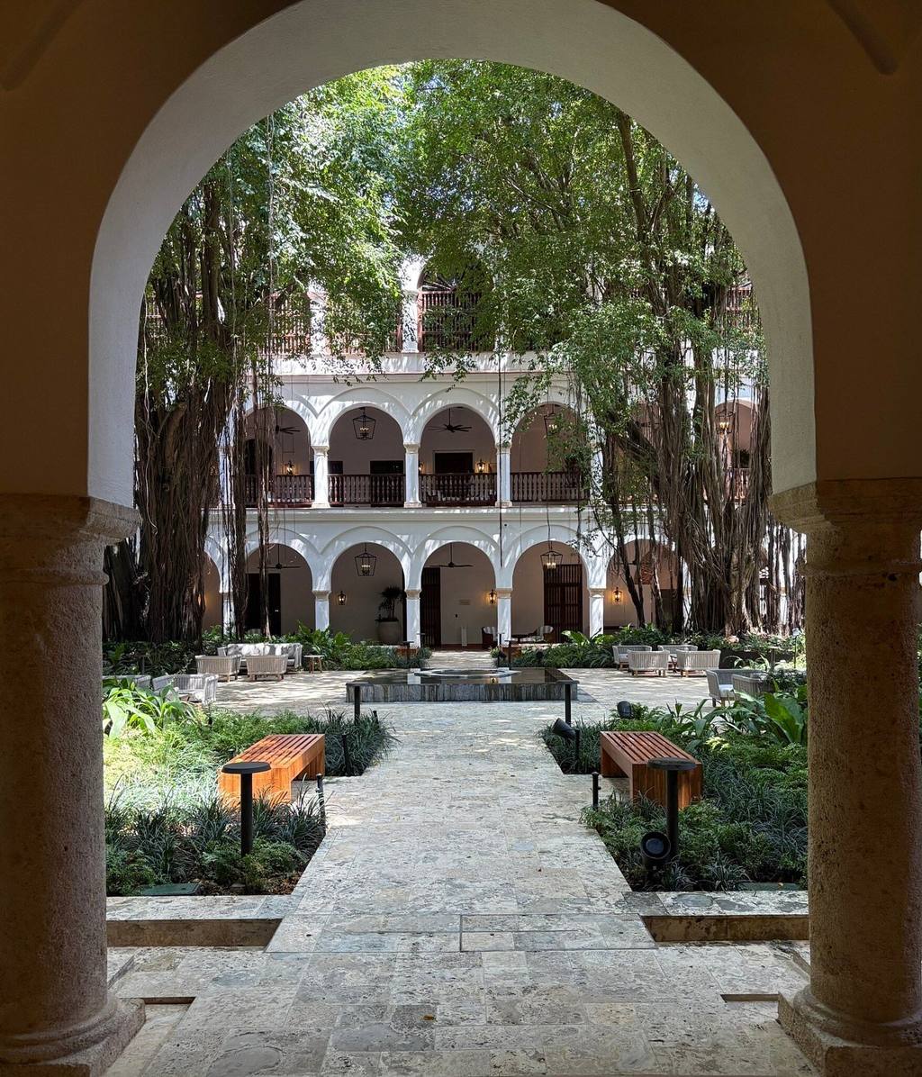 Courtyard with blue doors at the Getsemaní property listed as Four Seasons Hotels and Resorts