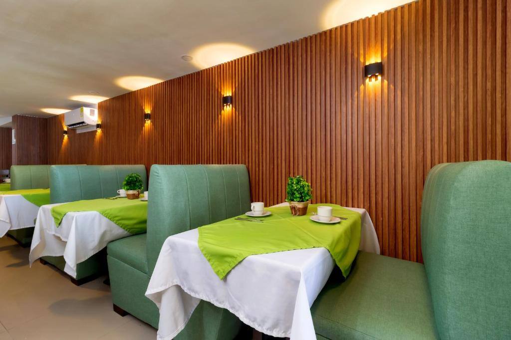 Hotel Avexi Suites By Geh Suites: Restaurant